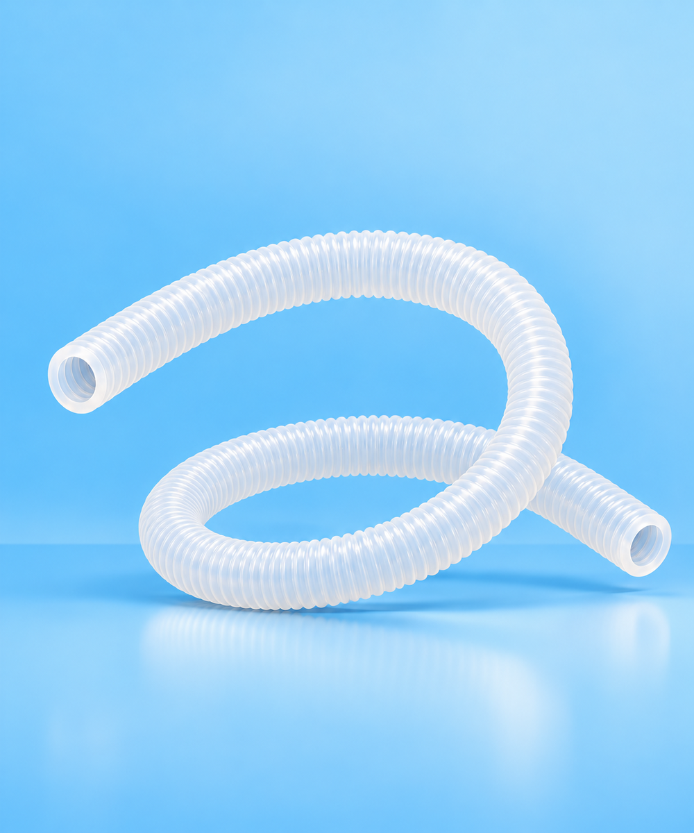 White ribbed flexible hose on a blue background, looped into curves