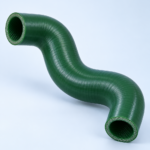 Green flexible industrial hose bent in a sweeping curve, showing braided ends and glossy surface.